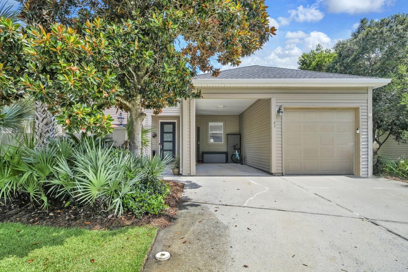 Welcome to 65 Courtyard Circle, where coastal living meets - photo 2