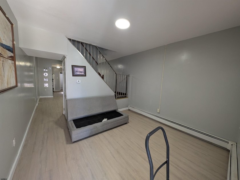 Newly Renovated Single Family Row Home. Two Story, Three - photo 3