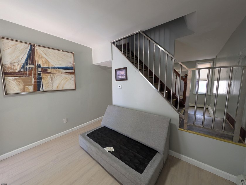 Newly Renovated Single Family Row Home. Two Story, Three - photo 4