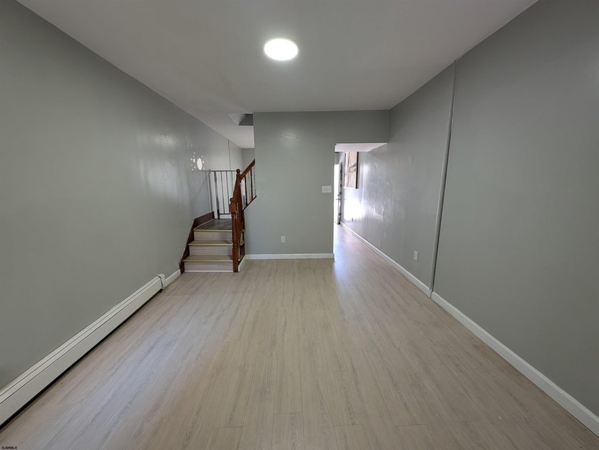 Newly Renovated Single Family Row Home. Two Story, Three - photo 5