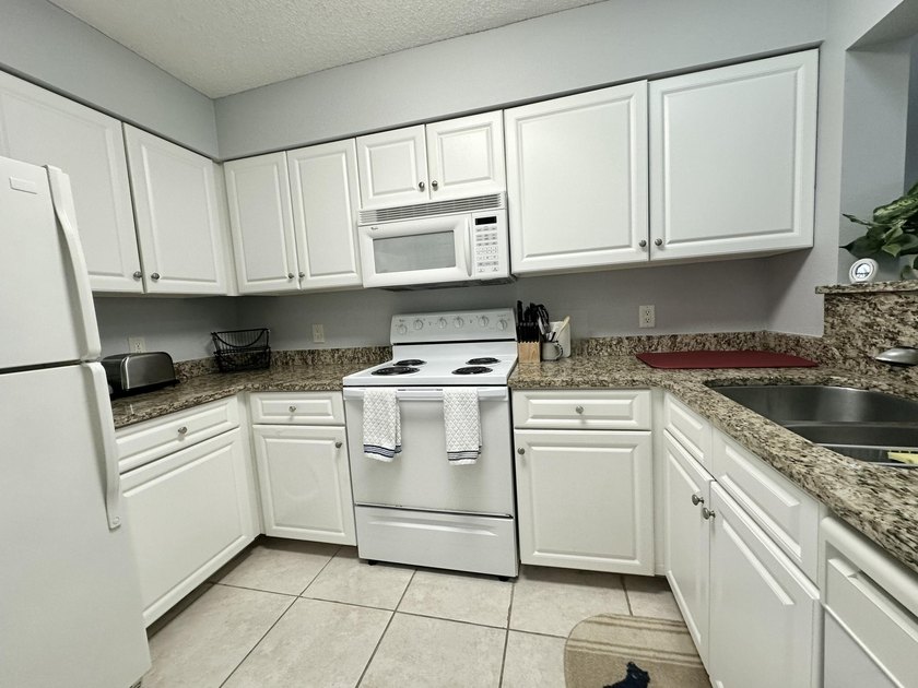 This 2-bedroom, 2-bath condo in The Florida Club blends comfort - photo 8