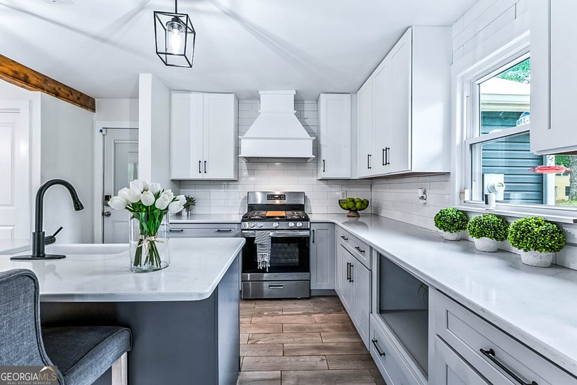 Welcome to your dream farmhouse where timeless charm meets - photo 3