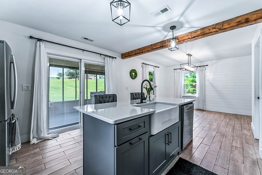 Welcome to your dream farmhouse where timeless charm meets - photo 5