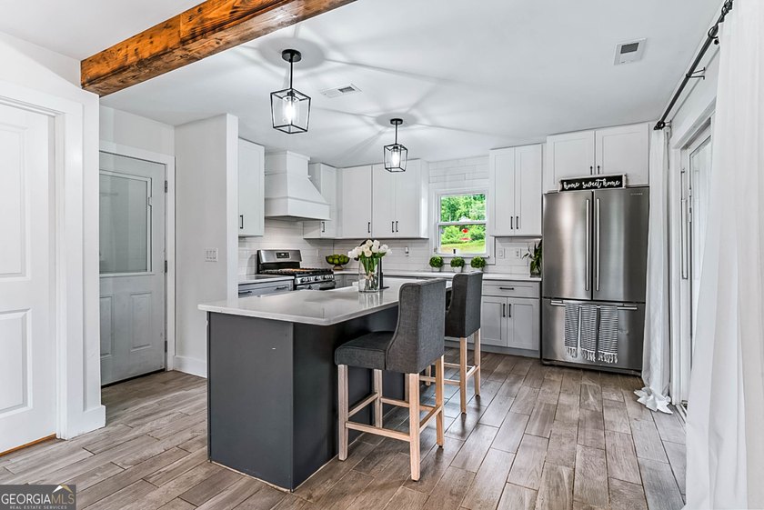 Welcome to your dream farmhouse where timeless charm meets - photo 6