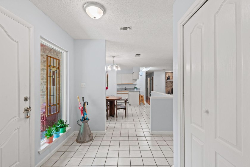 Ultimate Coastal Oasis: 4BR Home on Rare .553 Acre with Private - photo 9