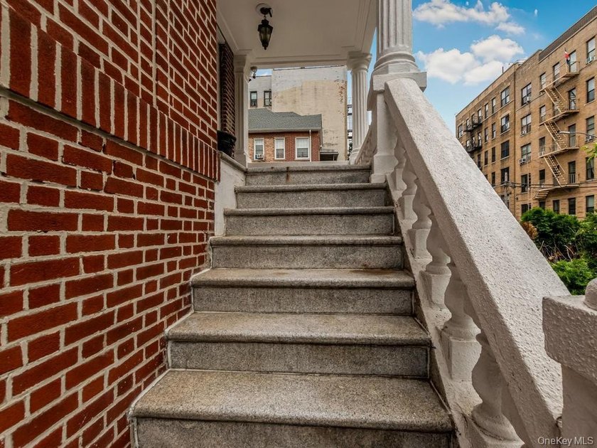 Welcome to 1858 Phelan Place in the Morris Heights section of - photo 3