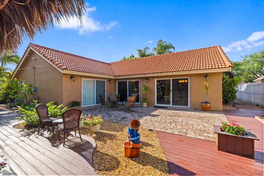 This charming one-story home features a spacious open floor plan - photo 11
