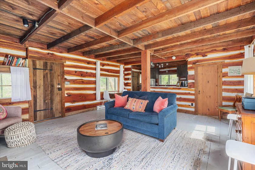 One-of-a-kind riverfront living, where the rhythm of the Cacapon - photo 6
