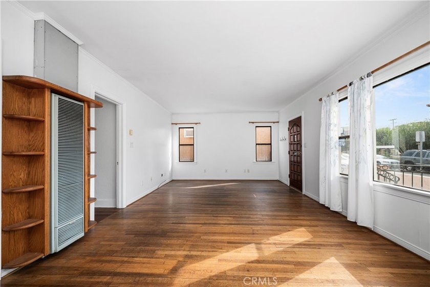 This 1924 low profile Spanish bungalow is located in one of the - photo 11