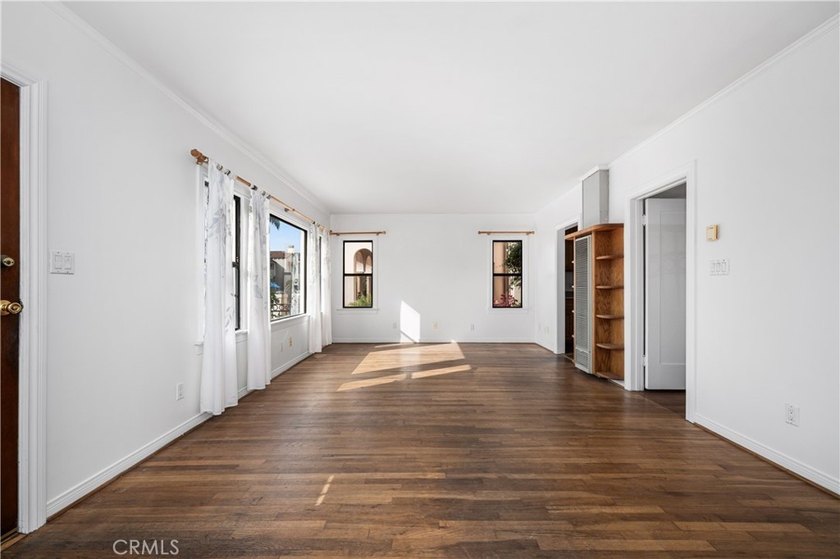 This 1924 low profile Spanish bungalow is located in one of the - photo 14