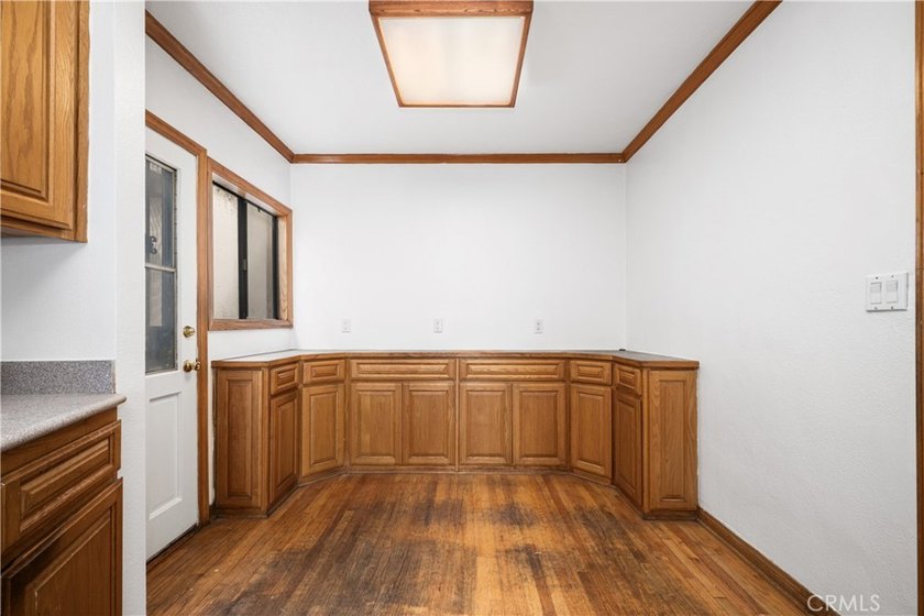 This 1924 low profile Spanish bungalow is located in one of the - photo 18
