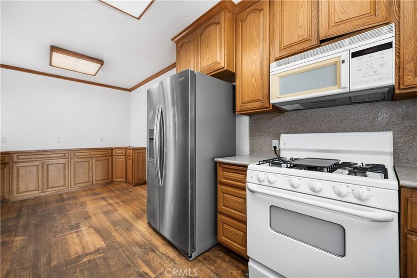 This 1924 low profile Spanish bungalow is located in one of the - photo 19
