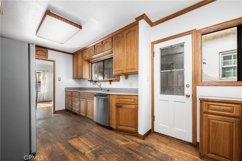 This 1924 low profile Spanish bungalow is located in one of the - photo 21