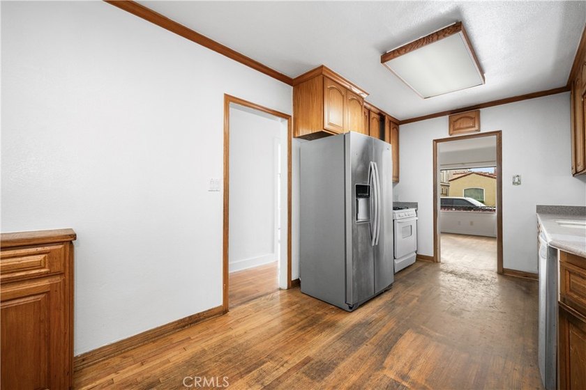 This 1924 low profile Spanish bungalow is located in one of the - photo 22