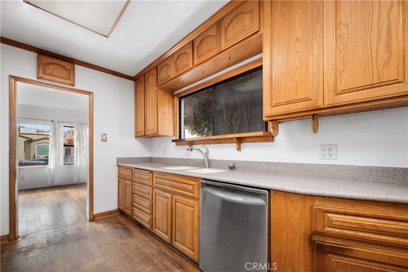 This 1924 low profile Spanish bungalow is located in one of the - photo 24