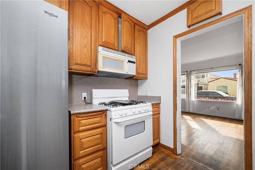 This 1924 low profile Spanish bungalow is located in one of the - photo 25