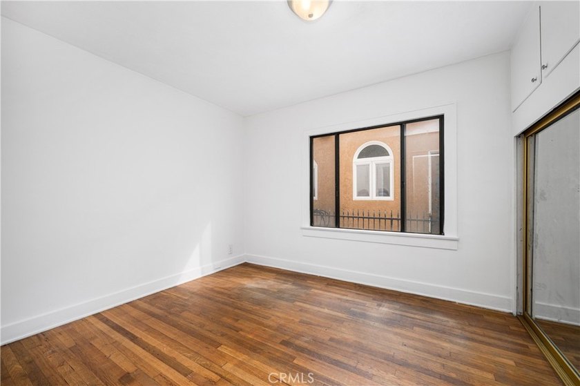 This 1924 low profile Spanish bungalow is located in one of the - photo 26