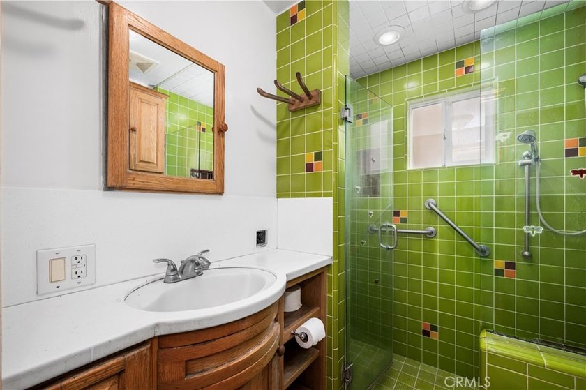 This 1924 low profile Spanish bungalow is located in one of the - photo 30