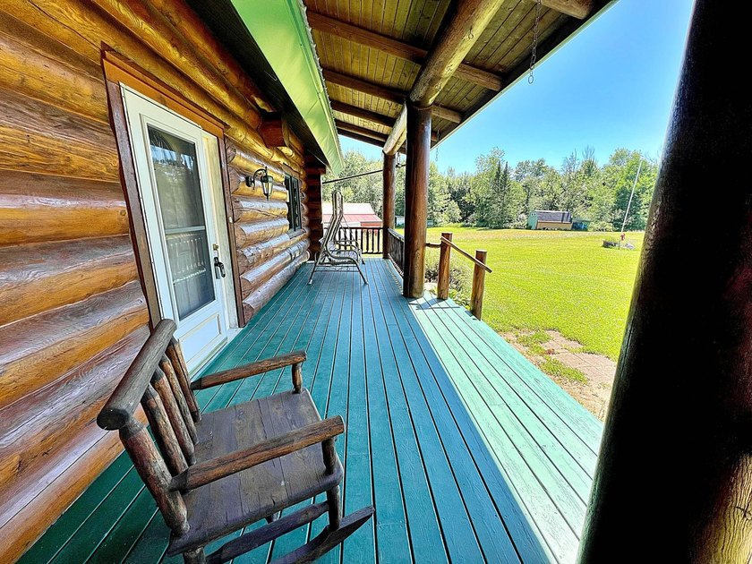 Authentic log cabin retreat on 80 picturesque acres featuring a - photo 42