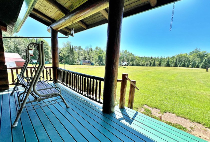 Authentic log cabin retreat on 80 picturesque acres featuring a - photo 44