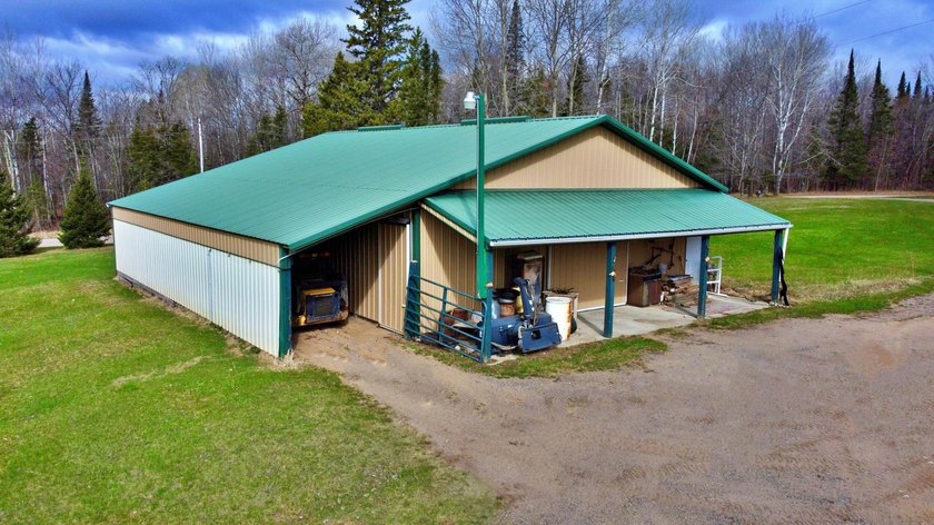 Authentic log cabin retreat on 80 picturesque acres featuring a - photo 48