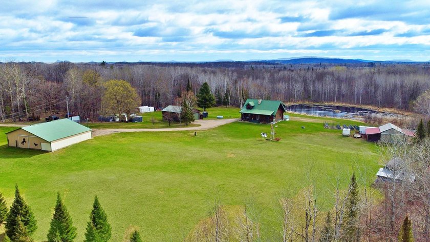 Authentic log cabin retreat on 80 picturesque acres featuring a - photo 49