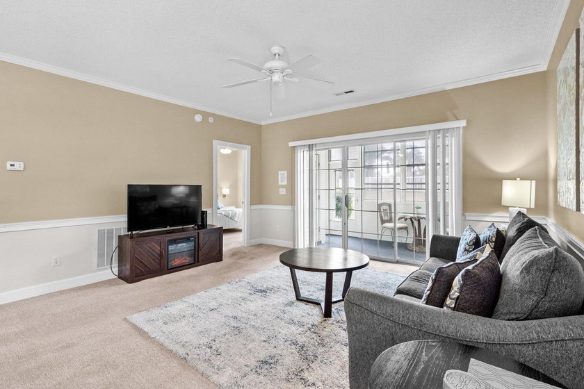 Welcome to 687 Riverwalk Dr, Unit 104, a coastal condo located - photo 7