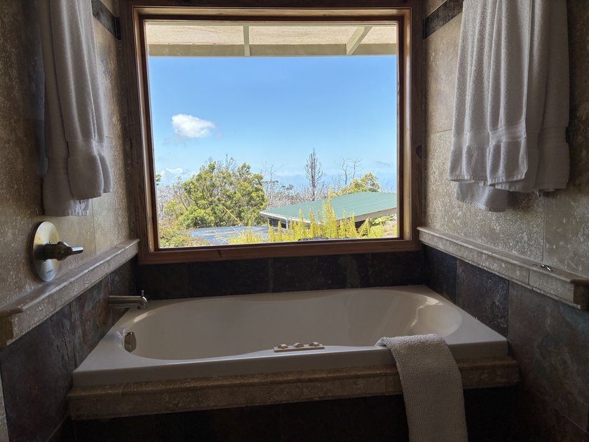 Perched atop a private hilltop with Pacific Ocean views, this - photo 17