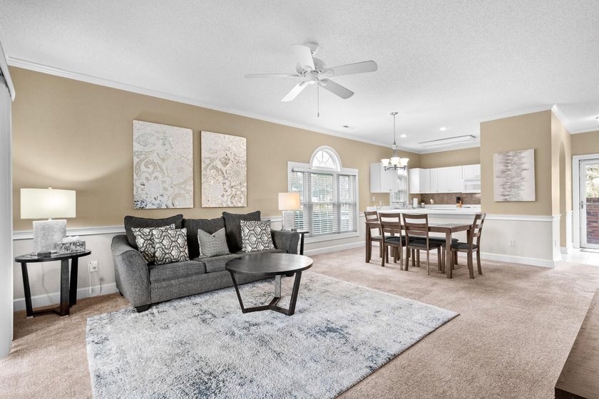 Welcome to 687 Riverwalk Dr, Unit 104, a coastal condo located - photo 9