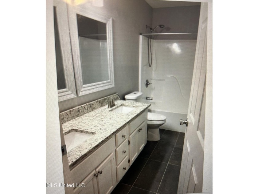 Dont miss this 4 bedroom newly remodeled home with double garage - photo 2