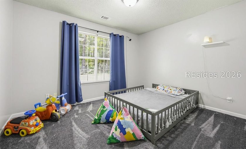 Welcome to 24 Eagle Trace, a beautifully maintained home nestled - photo 12