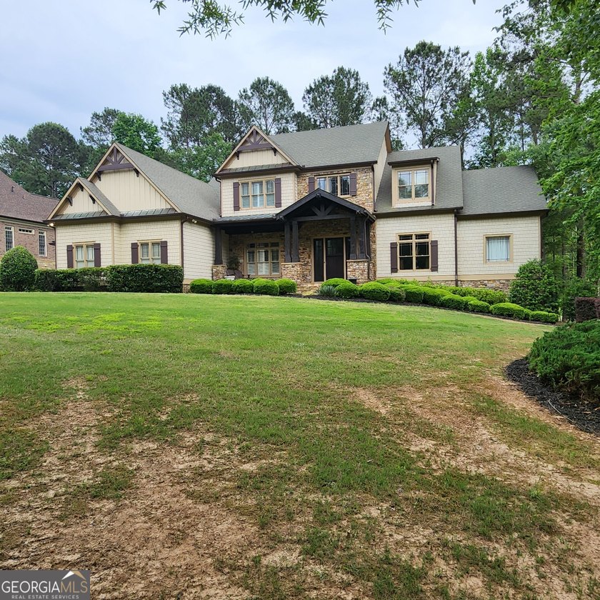 Located in the sought-after Governors Towne Club community, this - photo 2