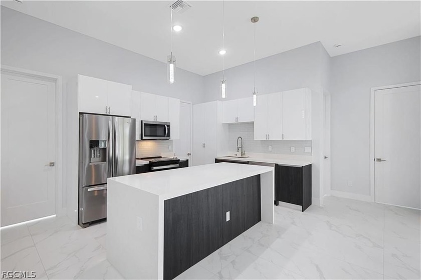 *Pre-Construction Fresh Water Canal Pool Home* Introducing the - photo 5