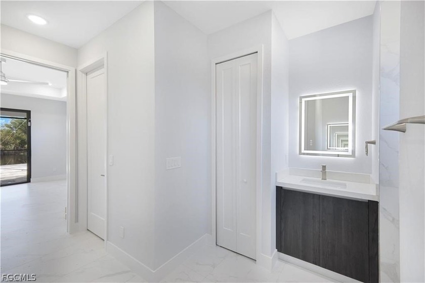 *Pre-Construction Fresh Water Canal Pool Home* Introducing the - photo 9