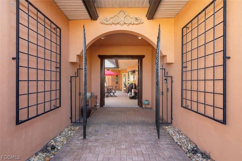 This stunning courtyard pool home at 15431 Greenock Ln, Fort - photo 3