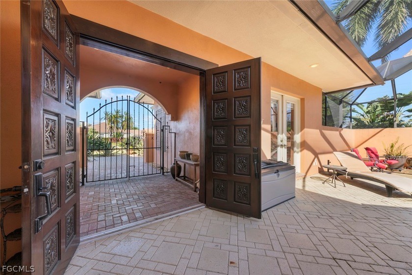 This stunning courtyard pool home at 15431 Greenock Ln, Fort - photo 4