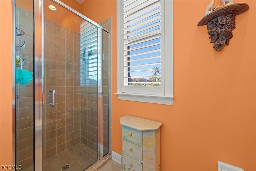 This stunning courtyard pool home at 15431 Greenock Ln, Fort - photo 8