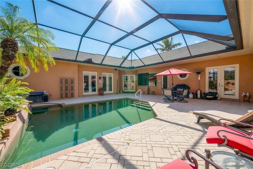 This stunning courtyard pool home at 15431 Greenock Ln, Fort - photo 9
