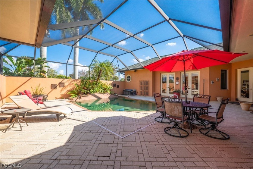 This stunning courtyard pool home at 15431 Greenock Ln, Fort - photo 10