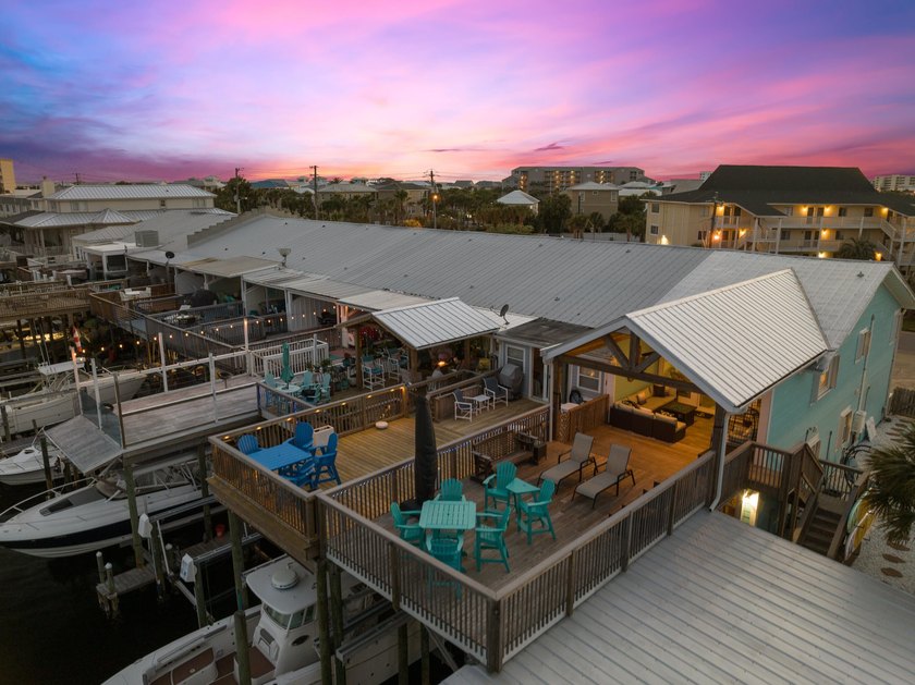 Waterfront living meets beach lifestyle in this beautifully - photo 5