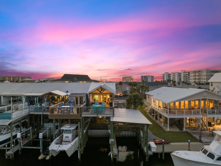Waterfront living meets beach lifestyle in this beautifully - photo 6