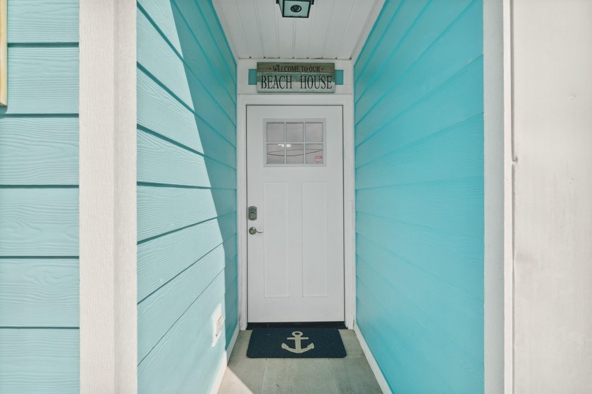 Waterfront living meets beach lifestyle in this beautifully - photo 7