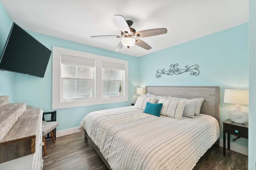 Waterfront living meets beach lifestyle in this beautifully - photo 9