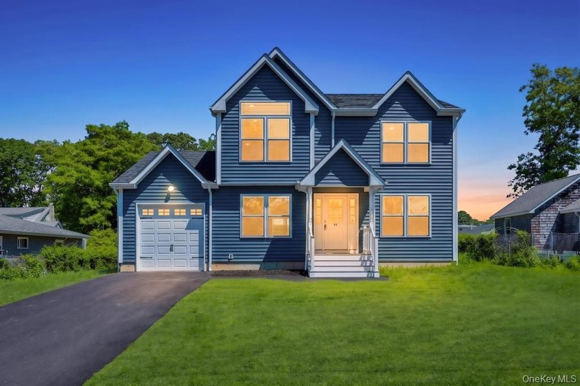 Welcome home in the heart of Mastic; a brand new construction - photo 2