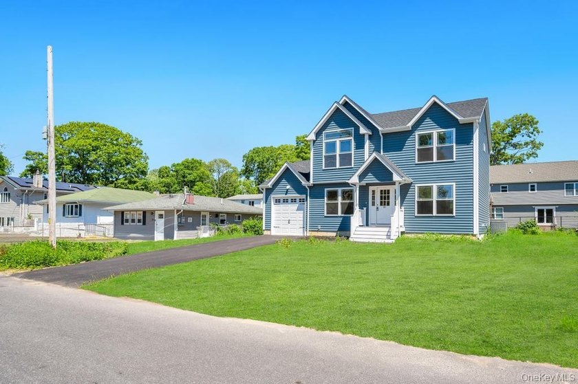 Welcome home in the heart of Mastic; a brand new construction - photo 4