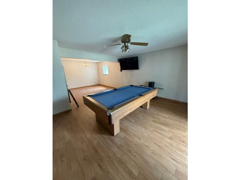 Main floor condo with enclosed patio on the north side of the - photo 13