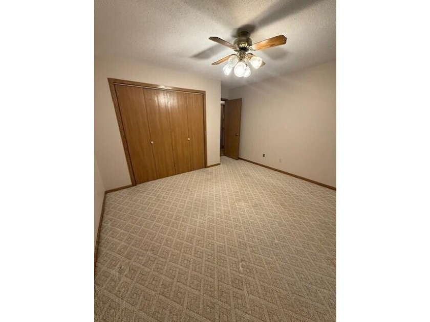 Main floor condo with enclosed patio on the north side of the - photo 20