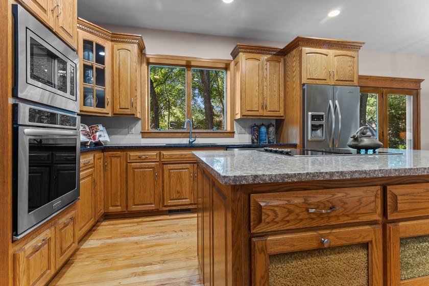 Welcome to this five-bedroom, four-bathroom, two-story home on a - photo 8
