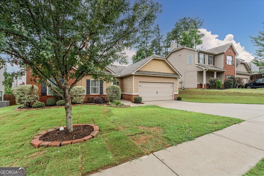 Welcome to this charming 3-bedroom, 2-bath ranch located in an - photo 3