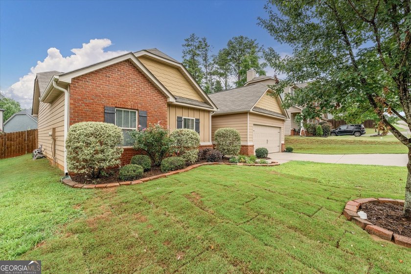Welcome to this charming 3-bedroom, 2-bath ranch located in an - photo 4